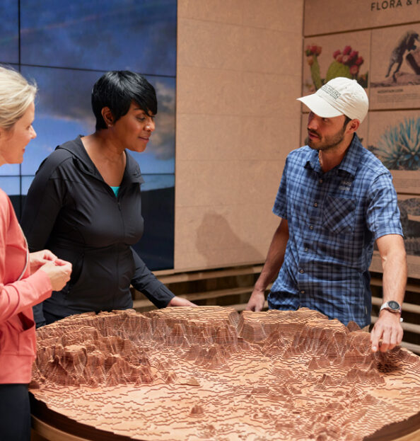 Adventure Advisor talking to guest at Trail house