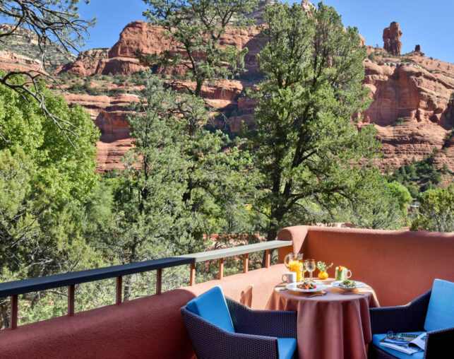 breakfast image on patio with blue chairs