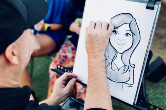 caricature artist drawing