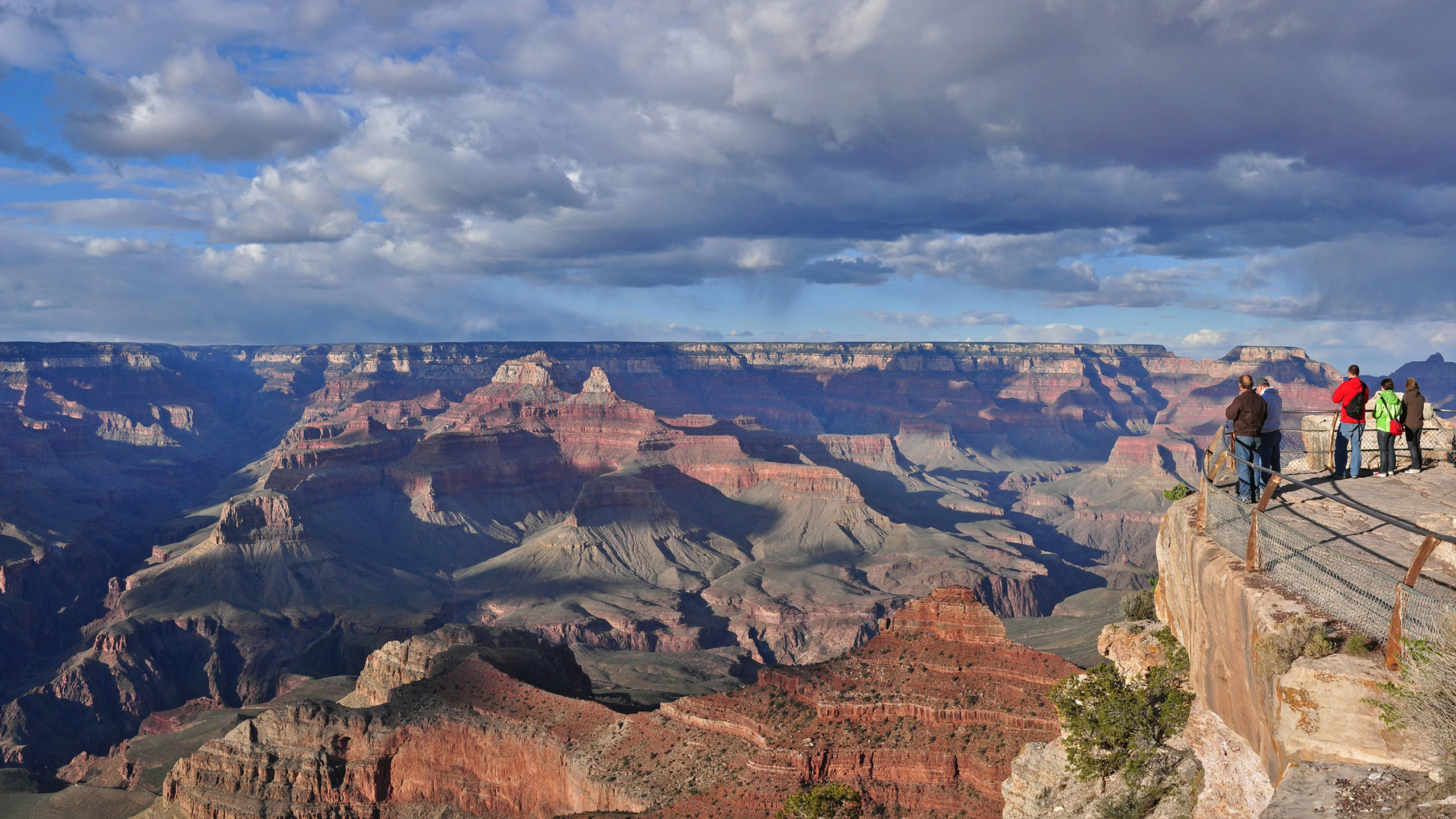 grand canyon with clouds in sky