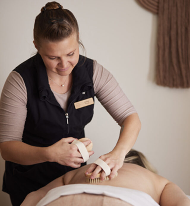 two women, spa service at Mii amo, massage