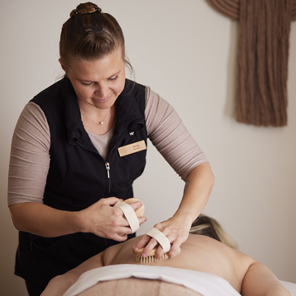 two women, spa service at Mii amo, massage
