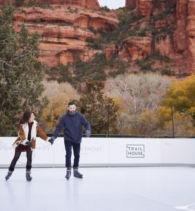 two people skating in the red rock of Sedona during Enchantment Resort's Red Rock Holidays