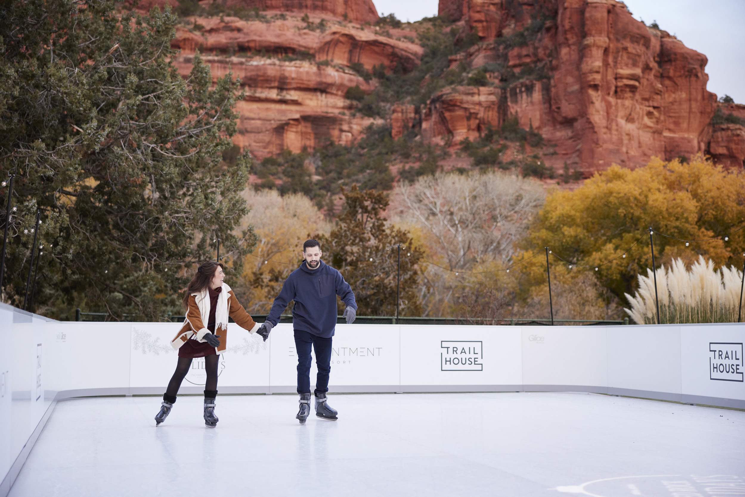 two people skating in the red rock of Sedona during Enchantment Resort's Red Rock Holidays