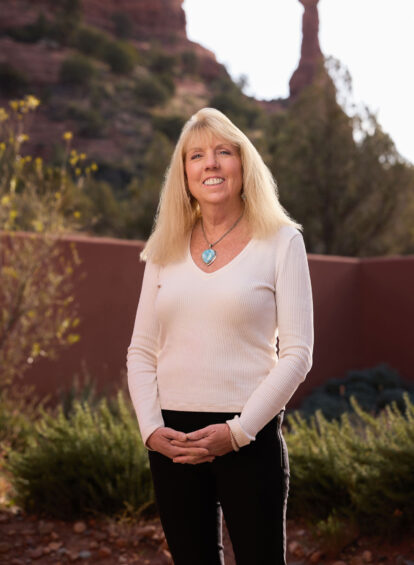 female practitioner at Mii amo spa, white shirt, black pants