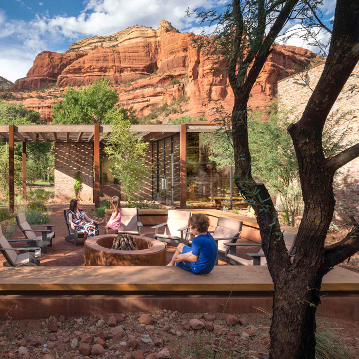 Trail House Exterior with Family